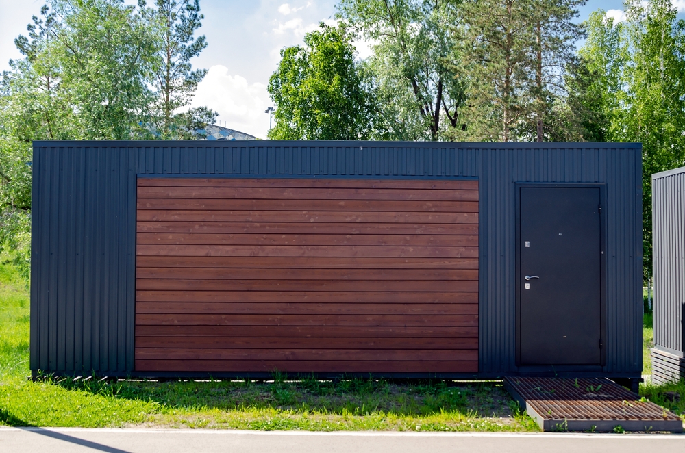 Contemporary,Shipping,Container,Building,Featuring,A,Stylish,Wooden,Door,Set
