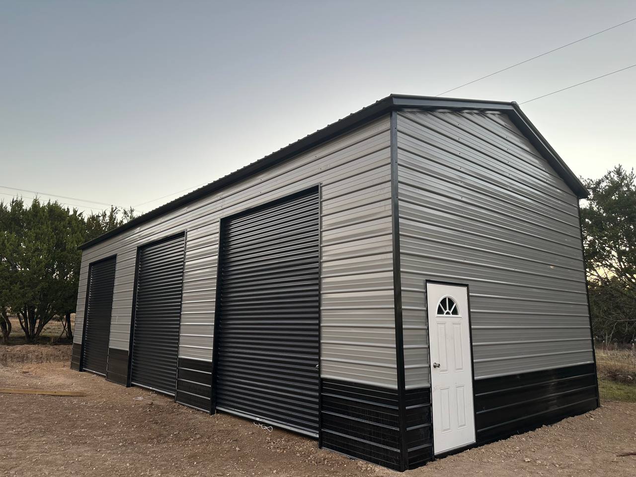 Tall Garage Workshop with 3 side tall roll up doors